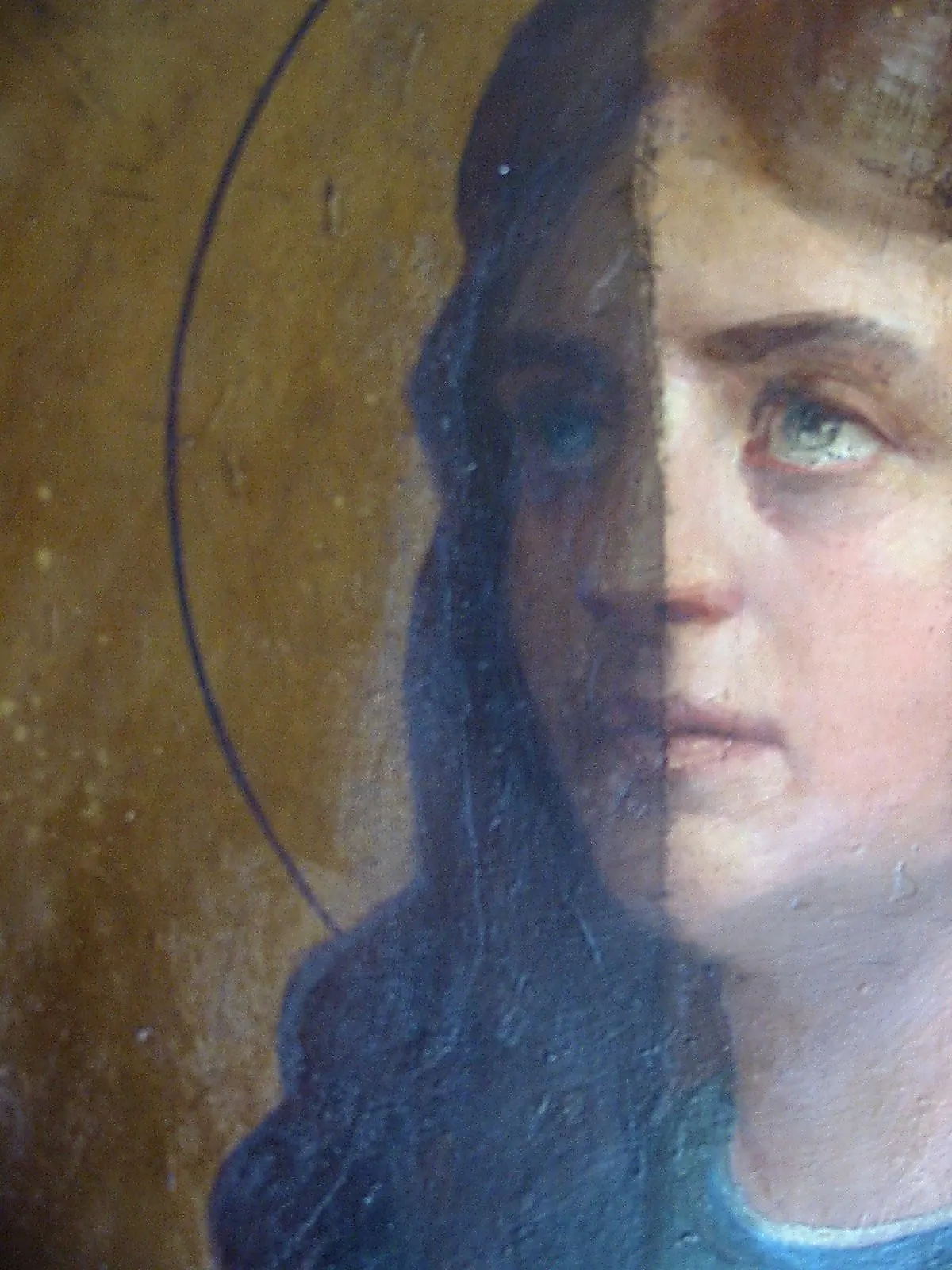 Restauration de l’ensemble des icônes d’une iconostase — église Saint-Julien-le-Pauvre — En cours de nettoyage : à gauche la couche encrassée, à droite la peinture dégagée